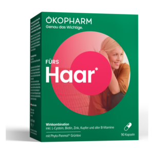 Verpackung für Haarpflegekapseln mit grüner Hintergrundfarbe und rotem Kreis. Enthält wichtige Vitamine und Nährstoffe.