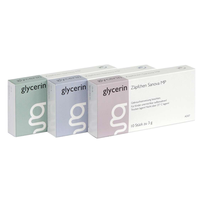 Drei Verpackungen mit Glycerin-Zäpfchen, unterschiedliche Farben und Beschriftungen, für die Anwendung bei Beschwerden.