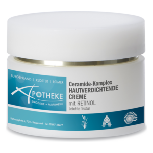 Hautverdichtende Creme im Tiegel mit weißem Deckel und blauer Etikettierung, enthält Retinol und einen Ceramide-Komplex.