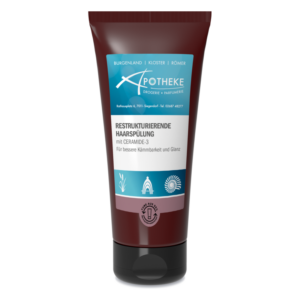 Braune Tube einer restrukturierenden Haarspülung mit Ceramid-3 für bessere Kämmbarkeit und Glanz.