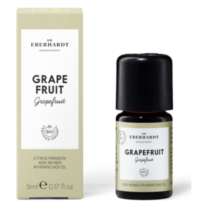 Flasche mit ätherischem Grapefruitöl in schwarzem Flakon und dazugehöriger Verpackung in sanften Grüntönen.