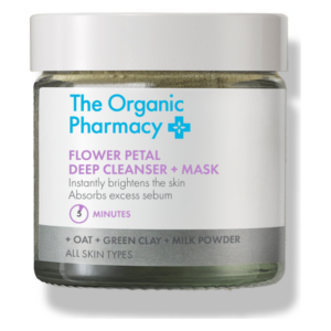 Glasbehälter mit einem tiefreinigenden Gesichtsreiniger und Maske, enthält Inhaltsstoffe wie Hafer, grüner Ton und Milchpulver.