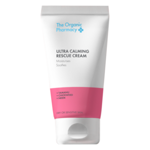 Tube mit der Aufschrift 'Ultra Calming Rescue Cream' in Weiß und Pink, geeignet für trockene oder empfindliche Haut.