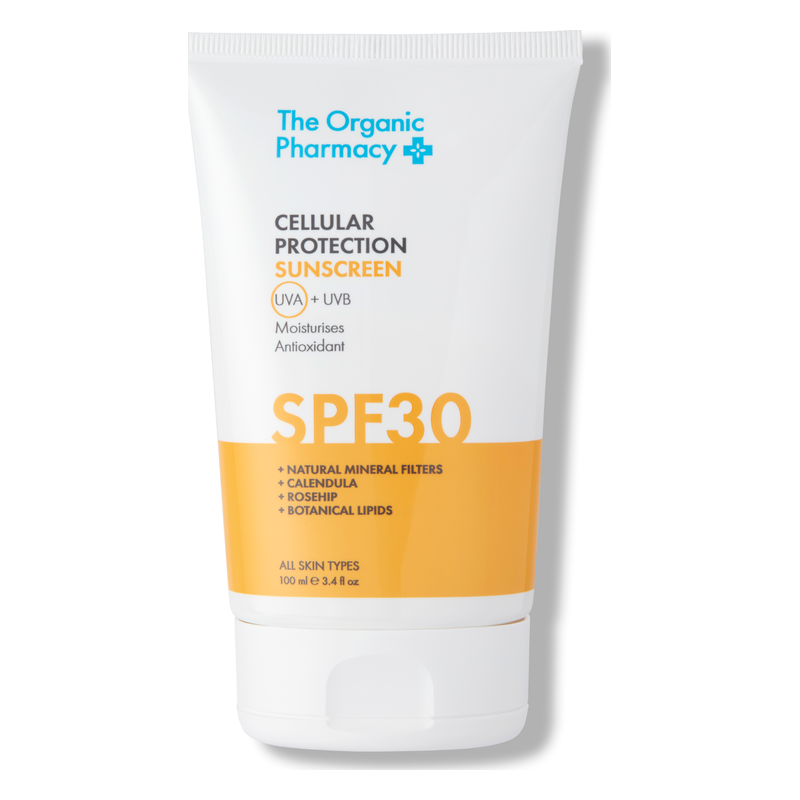 Sonnenschutzcreme in einer weißen Tube mit orangefarbenem Etikett und SPF 30, reich an natürlichen Inhaltsstoffen.
