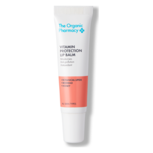 Lippenbalsam in einer weißen Tube mit orangefarbener Verschlussbanderole, zeigt Wirkstoffe und Hauttyp an.