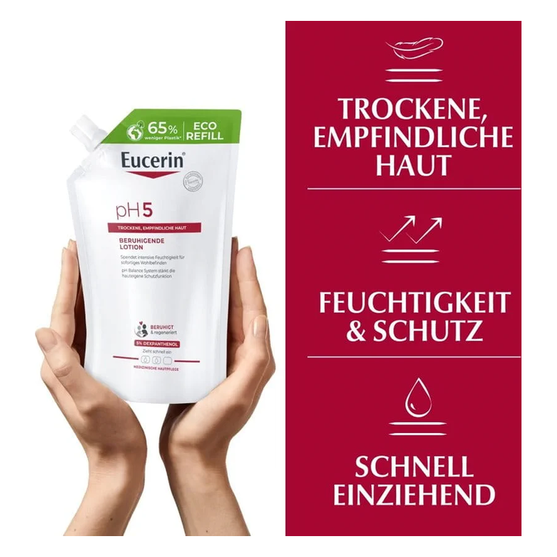 Hand hält einen apfelgrünen Nachfüllbehälter für Eucerin pH5 Beruhigende Lotion, der trockene und empfindliche Haut pflegt.