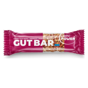 Mandel-Nuss-Riegel mit Meersalz und dunkler Schokolade in lila Verpackung mit dem Aufdruck "GUT BAR".